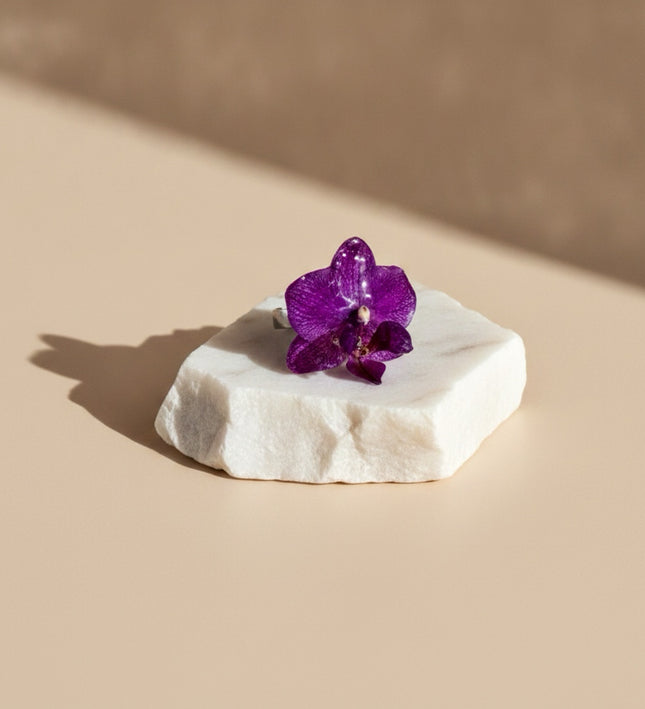 Rings with a real small flower.