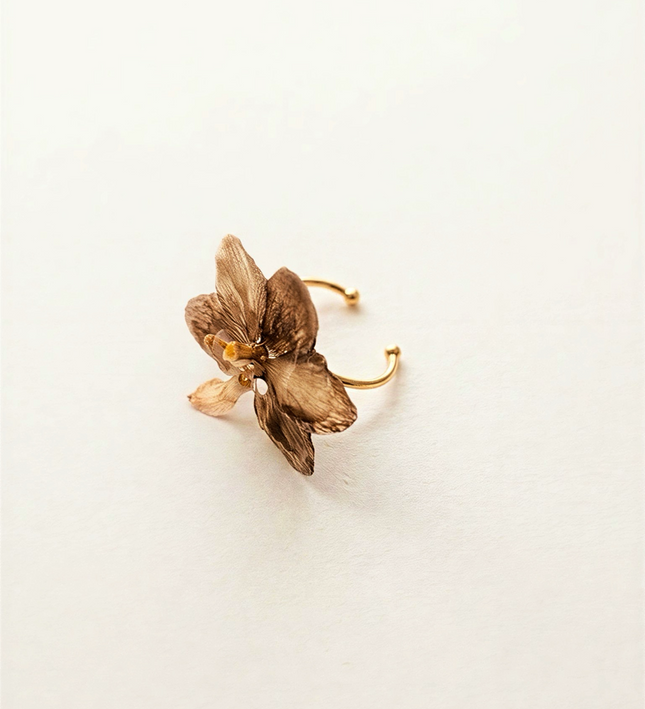 Rings with a real small flower.