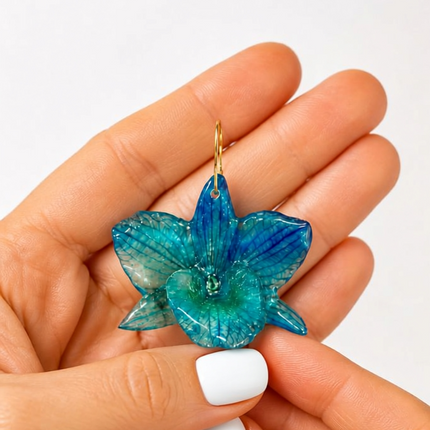 Σκουλαρίκια αληθινή ορχιδέα Dendrobium nobile blue σε υγρό γυαλί